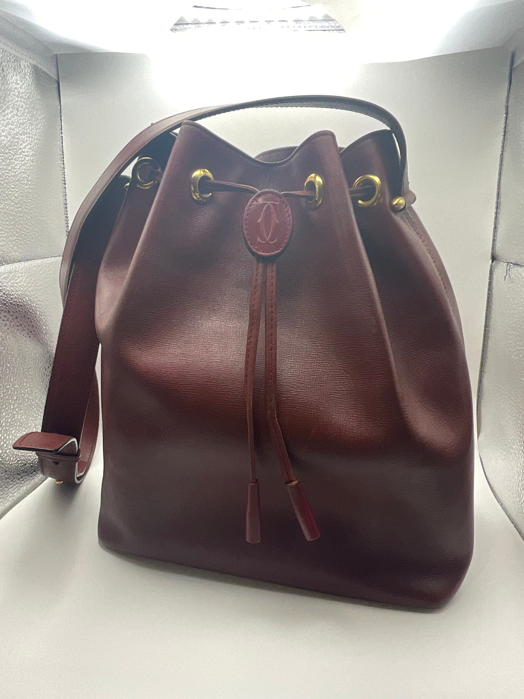 Cartier Must de Cartier Bordeaux Leather Drawstring Bucket Bag with COA
