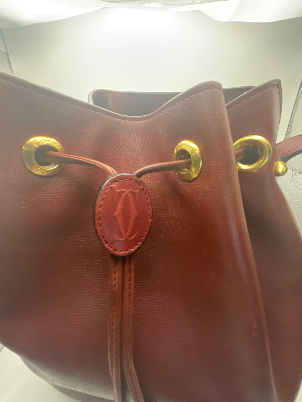 Cartier Must de Cartier Bordeaux Leather Drawstring Bucket Bag with COA